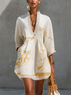 Aliénor | Mini Abito in Pizzo Crochet Avorio con Motivi Dorati e Scollo a V