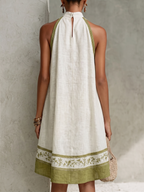 Agathe | Mini Abito Trapezio Senza Maniche Bianco e Verde Oliva Floreale
